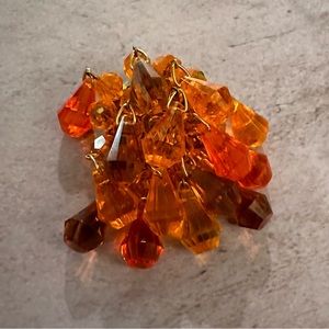 Vintage orange beaded brooch